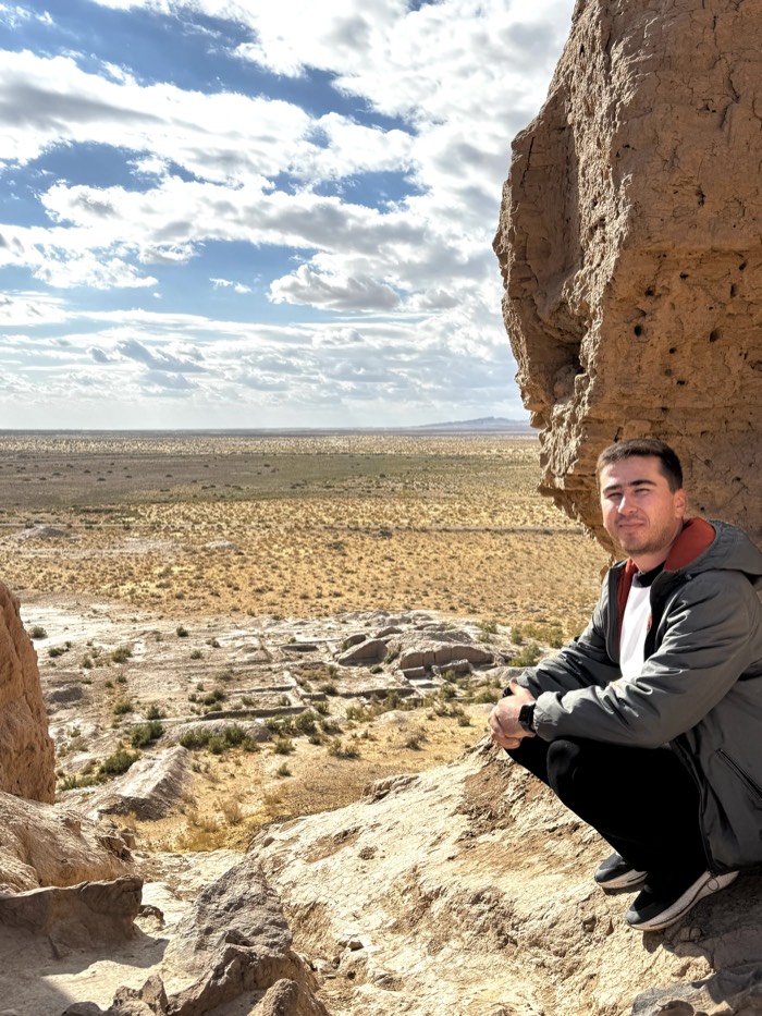 Bakhram, Khiva-born guide, at a Khorezm desert fortress overlooking the Kyzylkum