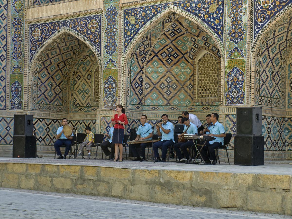 A folklore music performance at a historic madrasah courtyard in Bukhara, representative photo -- not yet an actual photo of this Khiva experience
