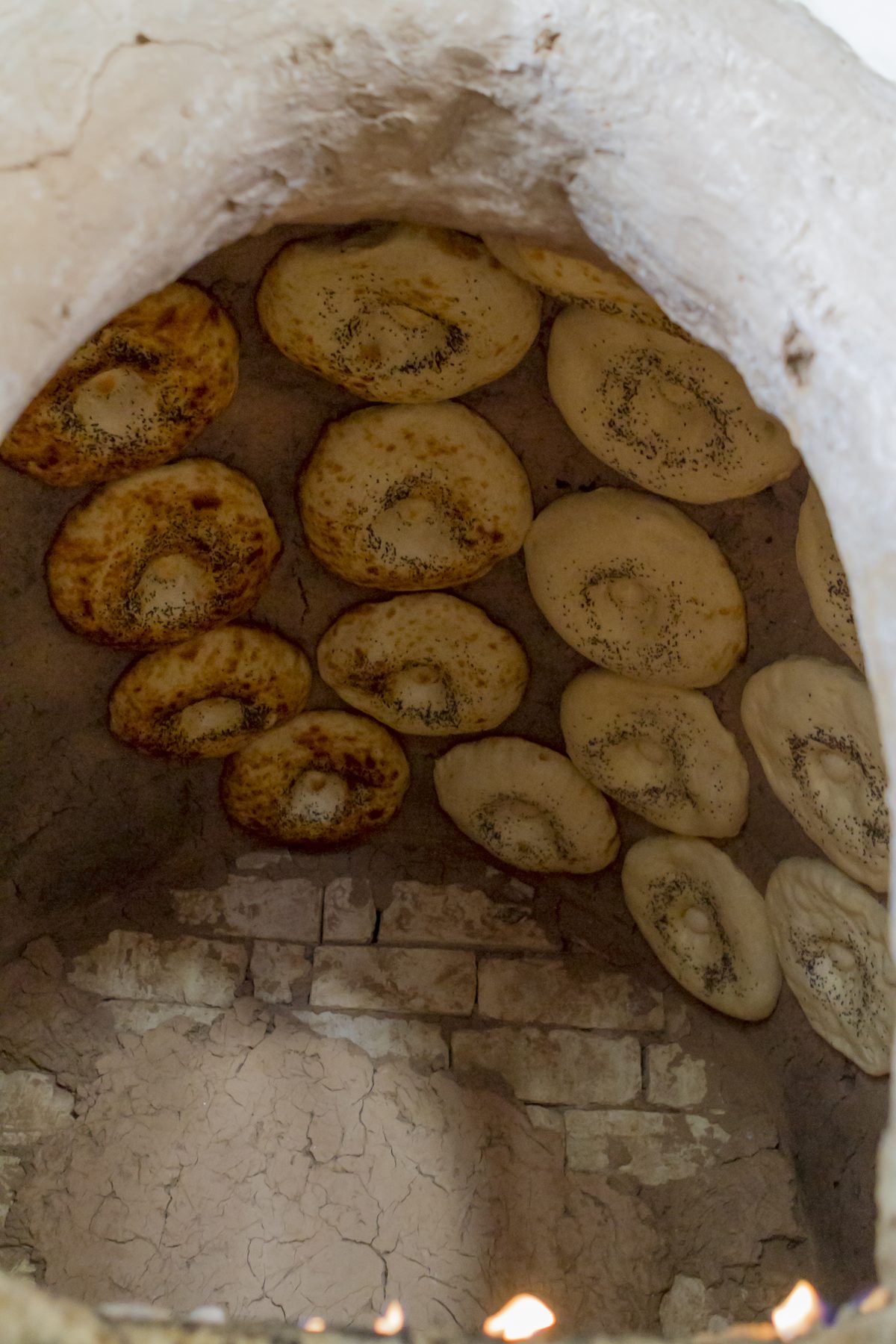 Traditional Uzbek nan bread baking in a tandyr oven, representative photo -- not yet an actual photo of this Khiva class
